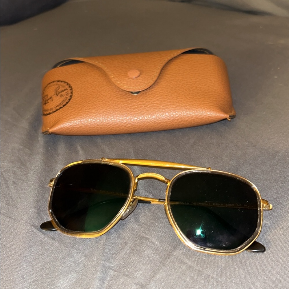 Black Ray Ban sunglasses with tan Ray Ban case